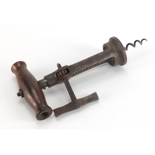 69 - 19th century corkscrew with side rack, 18cm in length when closed