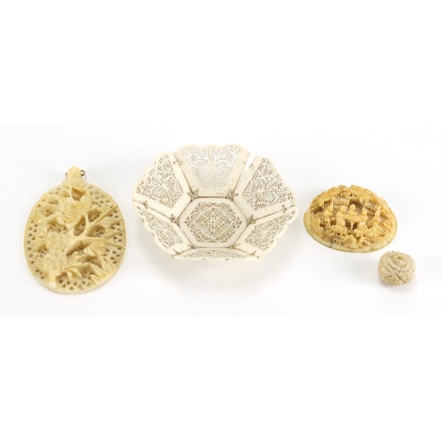 720 - Oriental ivory and bone including a Chinese Canton panel, Japanese Ojime and a hexagonal pierced bon... 