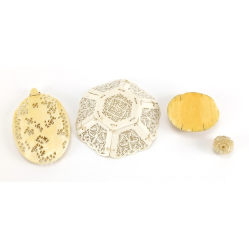 720 - Oriental ivory and bone including a Chinese Canton panel, Japanese Ojime and a hexagonal pierced bon... 