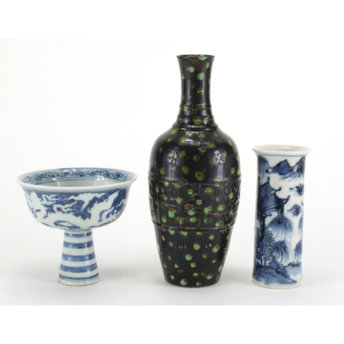 556 - Oriental ceramics including a Chinese blue and white porcelain stem bowl, incised with two dragons a... 