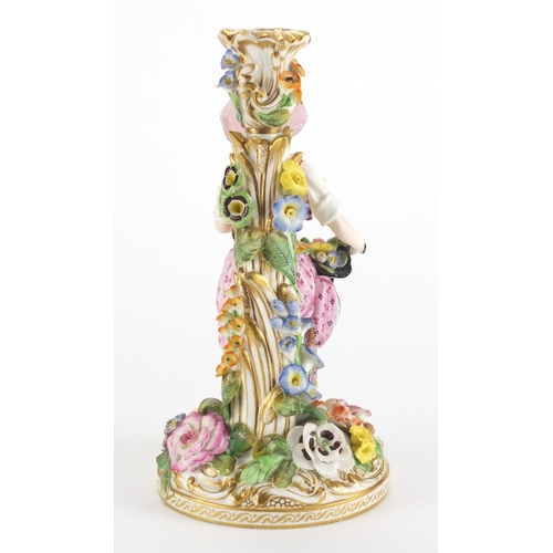 825 - 19th century floral encrusted figural candlestick, hand painted and gilded, 22cm high