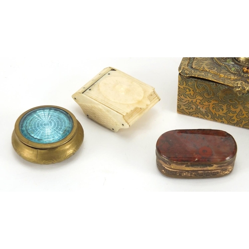 21 - Antique and later snuff boxes and trinkets including moss agate example, circular brass example with... 