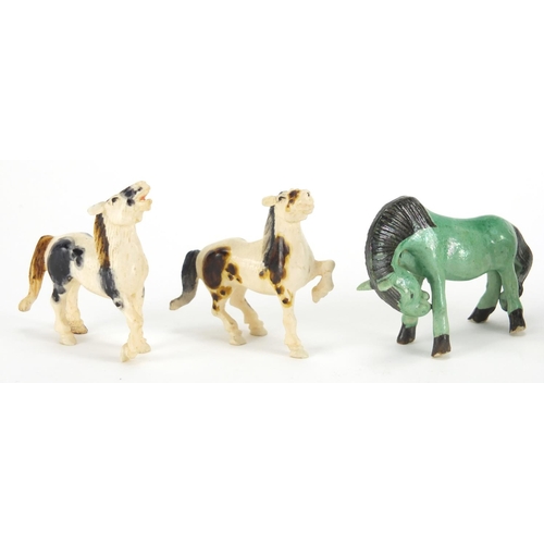 721 - Four Chinese carved ivory horses and two porcelain examples, the largest 6cm in length