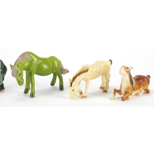 721 - Four Chinese carved ivory horses and two porcelain examples, the largest 6cm in length