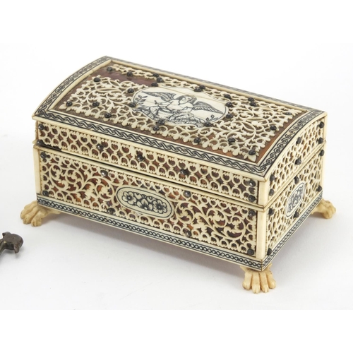 739 - Vizagapatam ivory, blonde tortoiseshell and sandalwood casket, together with a pair of Indian brass ... 