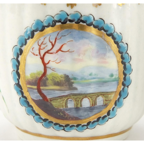 793 - 18th century Worcester porcelain coffee can and a tea cup, one hand painted with a Pastoral scene an... 