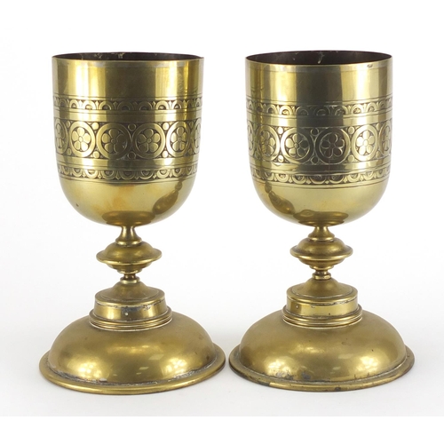 95 - Pair of 19th century brass chalices, each engraved with a continuous band of stylised flower heads, ... 