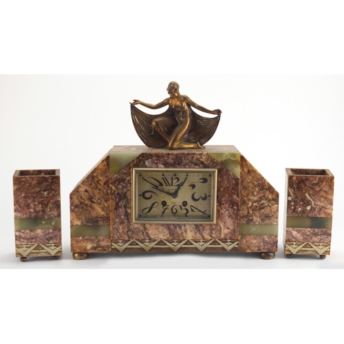 1267 - Art Deco marble and onyx mantel clock with garnitures, the clock mounted with a dancer signed F H Da... 