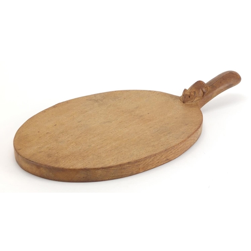 1042 - Robert Thompson Mouseman oak cheese board carved with a signature mouse, 38cm in length