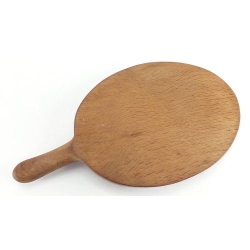 1042 - Robert Thompson Mouseman oak cheese board carved with a signature mouse, 38cm in length