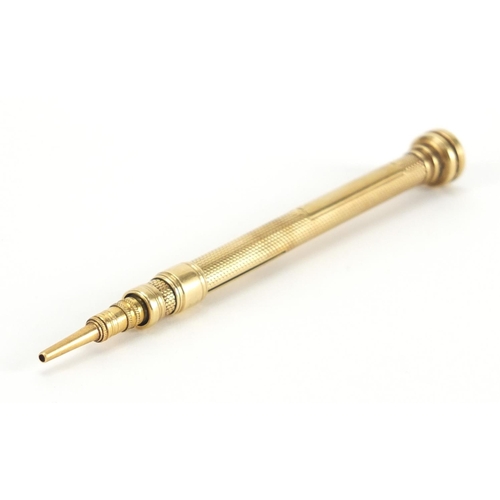 73 - S Mordan & Co unmarked gold propelling pencil, with engine turned body and green bloodstone top, 9.2... 