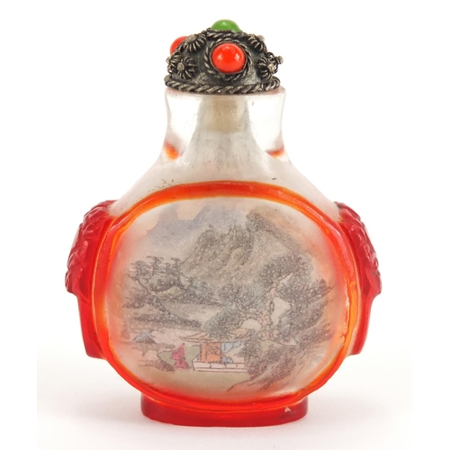 687 - Chinese Peking glass snuff bottle and stopper with animalia handles, internally hand painted with a ... 