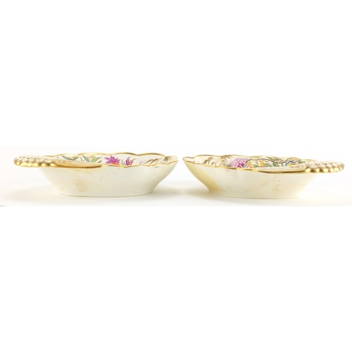829 - Pair of 19th century shell shape dishes, hand painted in the chinoiserie manner with figures and flo... 