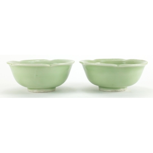 628 - Pair of Chinese celadon glazed porcelain lotus bowls, each 15.5cm in diameter
