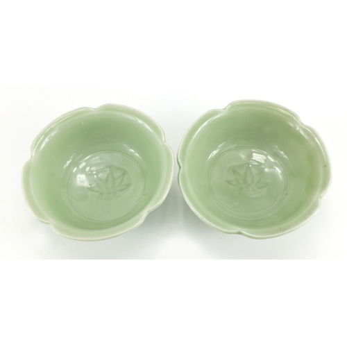 628 - Pair of Chinese celadon glazed porcelain lotus bowls, each 15.5cm in diameter