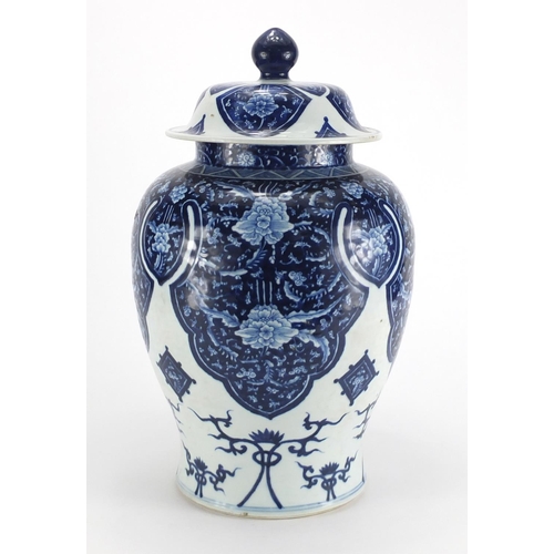 536 - Large Chinese blue and white porcelain baluster jar and cover, hand painted with flowers and foliage... 