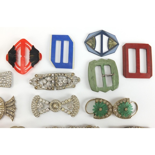 24 - Art Deco and later buckles, some two piece including Bakelite and Marcasite, the largest 10.5cm wide