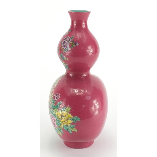 559 - Chinese porcelain pink ground double gourd vase, hand painted in the famille rose palette with two b... 