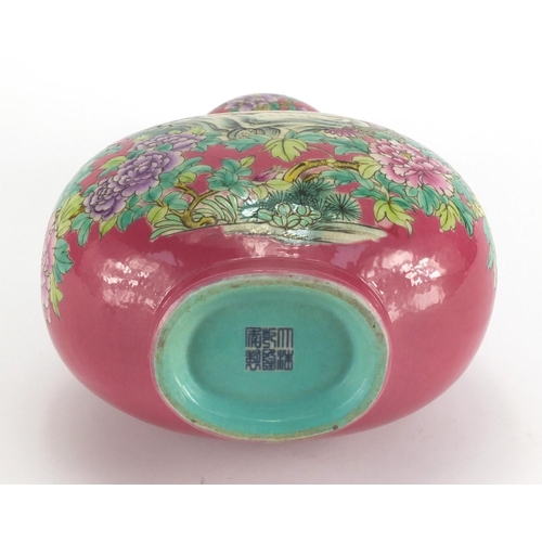 559 - Chinese porcelain pink ground double gourd vase, hand painted in the famille rose palette with two b... 
