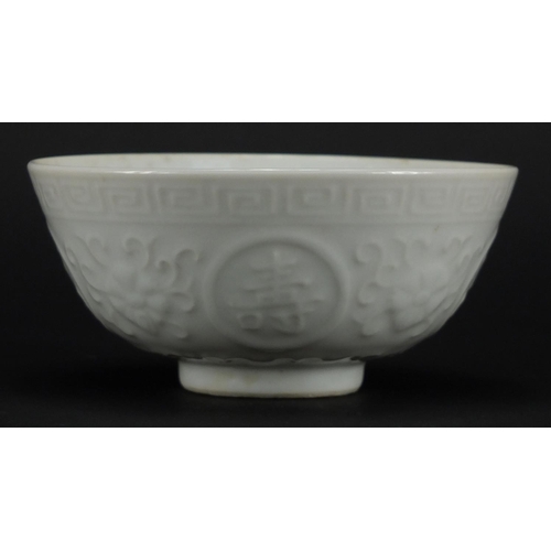 631 - Chinese porcelain Blanc De Chine footed bowl, decorated in low relief with flower heads and roundels... 