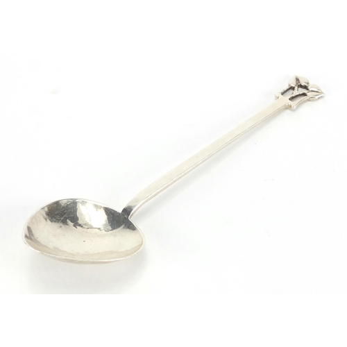 1040 - Arts & Crafts hammered silver spoon with fig shaped bowl and stylised floral finial, by A E Jones, B... 