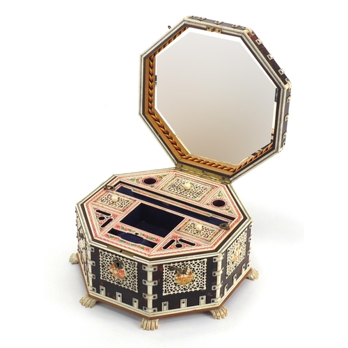 738 - 19th century Vizagapatam ivory and tortoiseshell octagonal dressing table box, with applied engraved... 