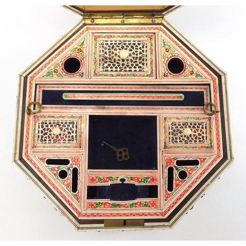 738 - 19th century Vizagapatam ivory and tortoiseshell octagonal dressing table box, with applied engraved... 