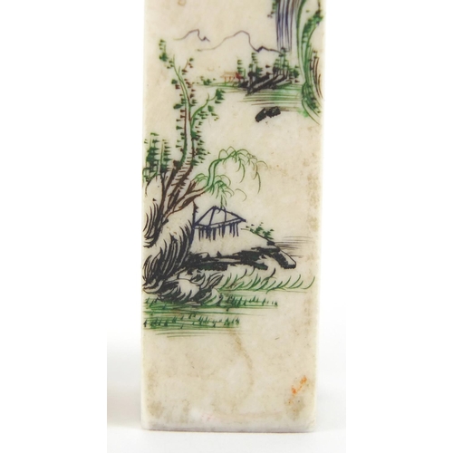 712 - Two Chinese ivory square desk seals, one carved with a river landscpae, the other with a crane on am... 