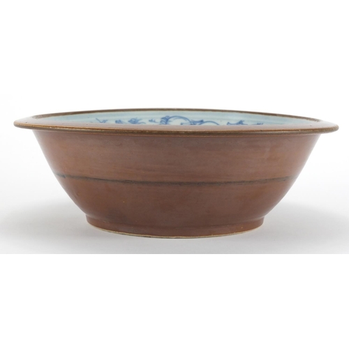 545 - Chinese brown glazed blue and white porcelain basin, the interior hand painted with foliate motifs, ... 