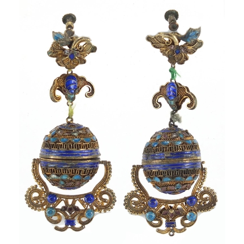 704 - Pair of Chinese gilt metal and enamel bat design drop earrings, with unscrewing hollow spherical cen... 