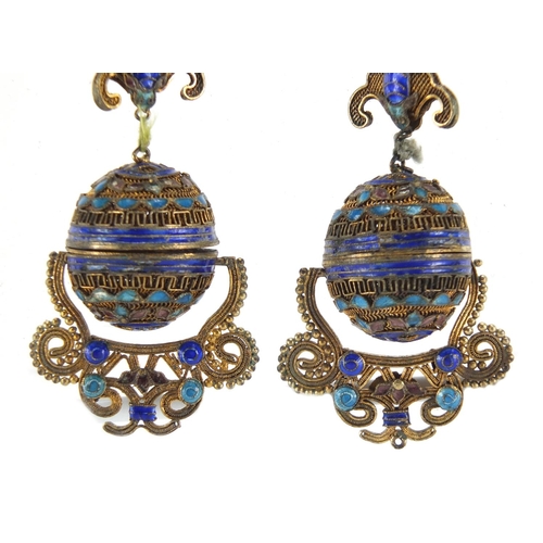 704 - Pair of Chinese gilt metal and enamel bat design drop earrings, with unscrewing hollow spherical cen... 