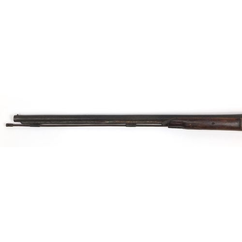 491 - 19th century percussion musket, the barrel with indistinct engraved letters and numbers, 123cm in le... 