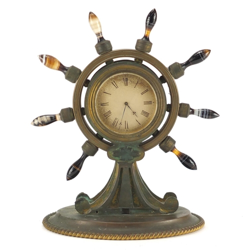 1265 - 19th century gilt bronze ships wheel design clock, with agate handles and Roman numerals, 24.5cm hig... 