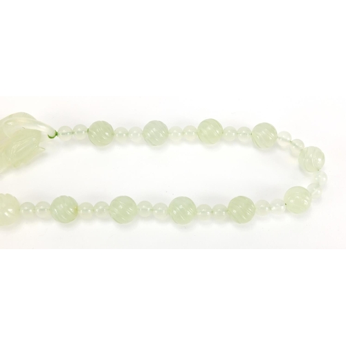 703 - Chinese pale green jade bead necklace, housed in a velvet lined box, 62cm in length