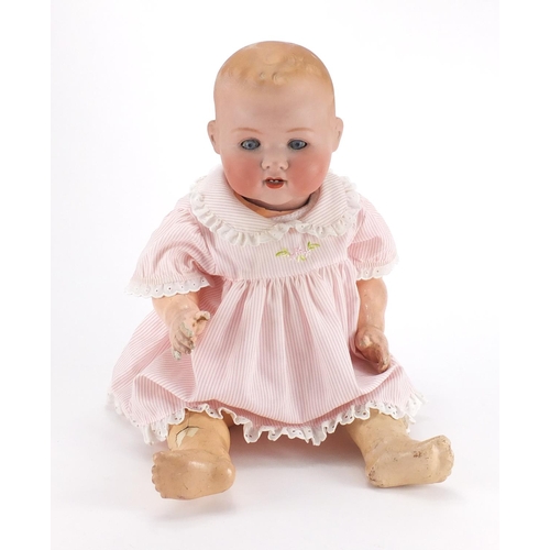 498 - Armand Marseille bisque headed doll, with open close eyes and jointed limbs in traditional dress, nu... 
