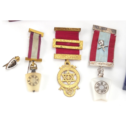 341 - Six Masonic jewels and a pin badge, the jewels including four silver, one with enamel engraved Prese... 