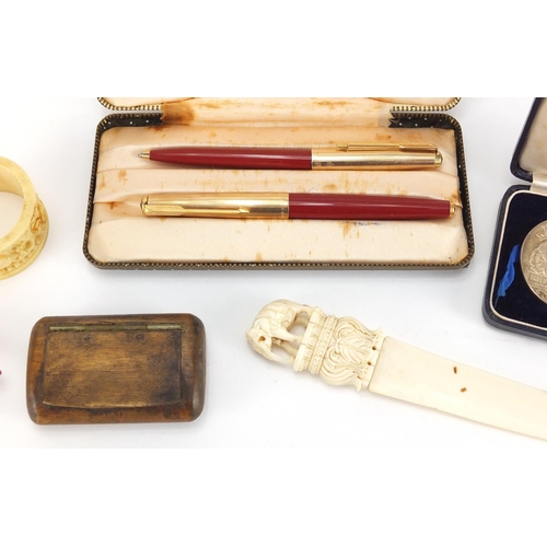 43 - Antique and later objects including a Parker 61 pen set, Indian carved ivory letter opener, pair of ... 