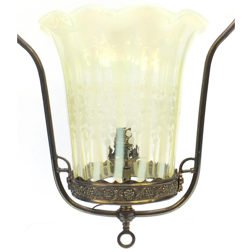 914 - Large Art Nouveau Vaseline glass light shade etched with flowers, housed in a brass hanging pendant ... 