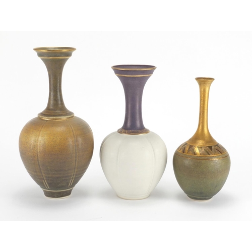 989 - Three Bridget Drakeford Studio pottery vases, each hand gilded and with incised marks around the rim... 