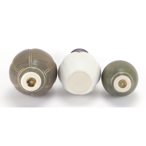 989 - Three Bridget Drakeford Studio pottery vases, each hand gilded and with incised marks around the rim... 