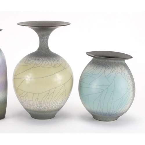 991 - Four David White Studio pottery vases, each with initials to the bases, the largest 19cm high