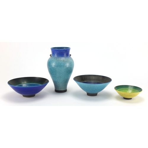 996 - Peter Sparrey raku studio pottery comprising three bowls and a vase, impressed marks to the bases, t... 