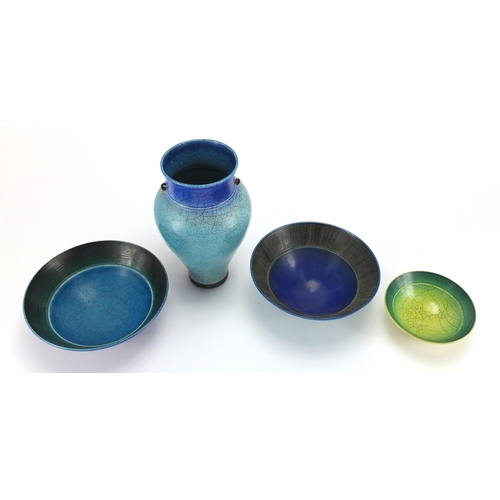 996 - Peter Sparrey raku studio pottery comprising three bowls and a vase, impressed marks to the bases, t... 