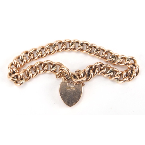 1066 - 9ct gold bracelet with love heart shaped padlock, 16cm in length, approximate weight 13.8g