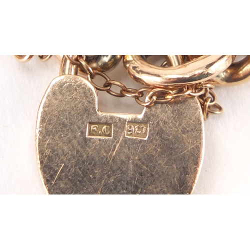 1066 - 9ct gold bracelet with love heart shaped padlock, 16cm in length, approximate weight 13.8g