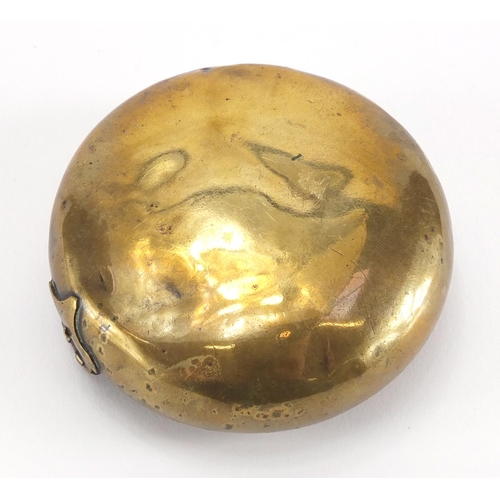 20 - Late 18th century circular brass secret snuff box, 8.5cm in diameter