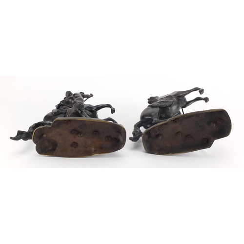 83 - After Guillaume Coustou The Elder - Pair of patinated bronze Marly horses with trainers, the largest... 