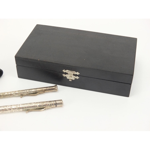 71 - Yard-O-Led sterling silver fountain pen and propelling pencil, embossed with foliage together with f... 