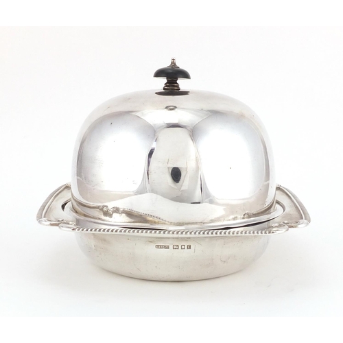 214 - Silver muffin dish with dome cover, retailed by Aprey, London 1932, 14cm high x 18cm wide, approxima... 
