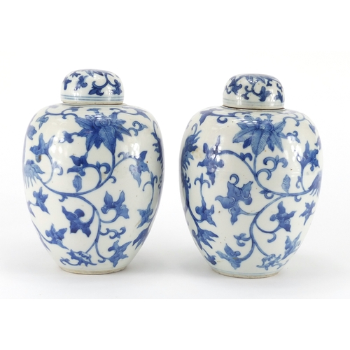 532 - Pair of Chinese blue and white porcelain jars and covers, each hand painted with two phoenixes among... 